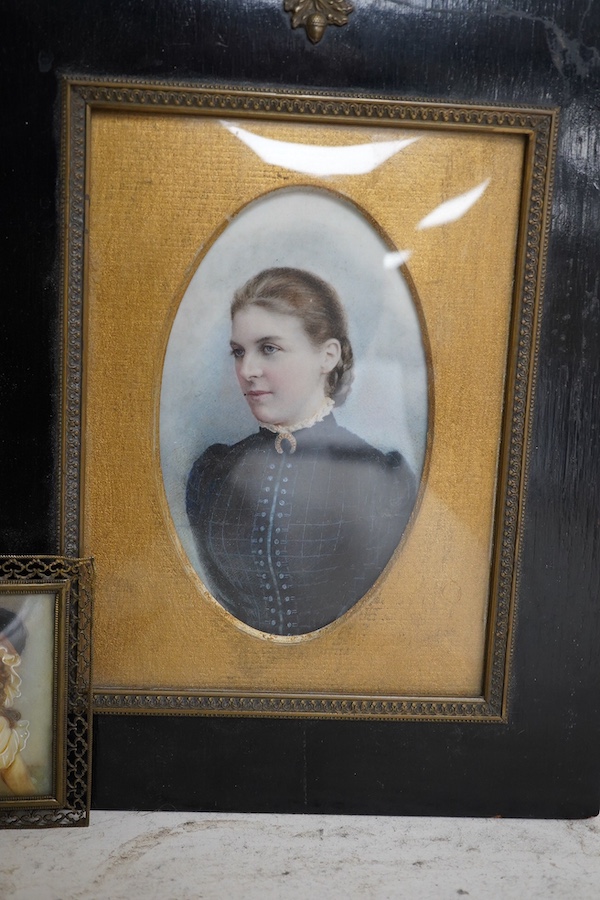 Two 19th century portrait miniatures on simulated ivory and card, comprising portrait of a Regency lady and portrait of a late Victorian lady in mourning, largest overall 24 x 19cm. Condition - fair